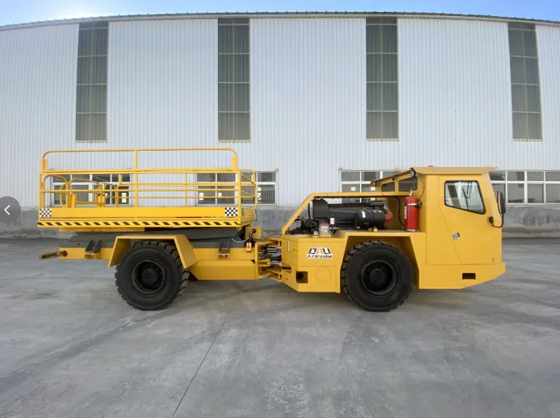 Yellow mining truck with a lowered work platform