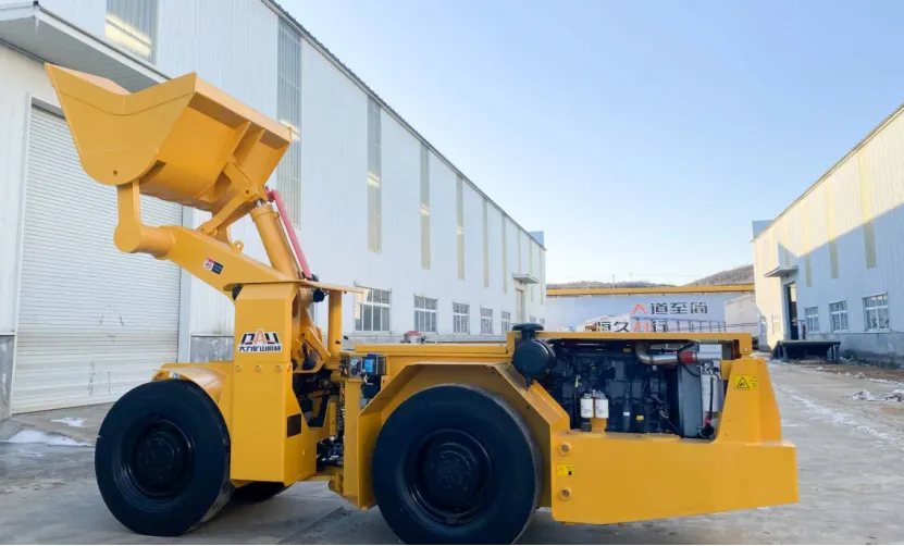 Yellow DALI underground mining LHD loader with raised bucket