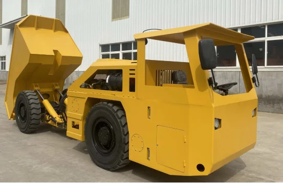 Underground dump truck with tilted box