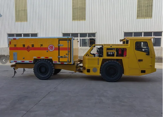 Yellow underground mining explosives transport truck